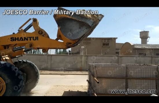 Filling military barriers with soil
