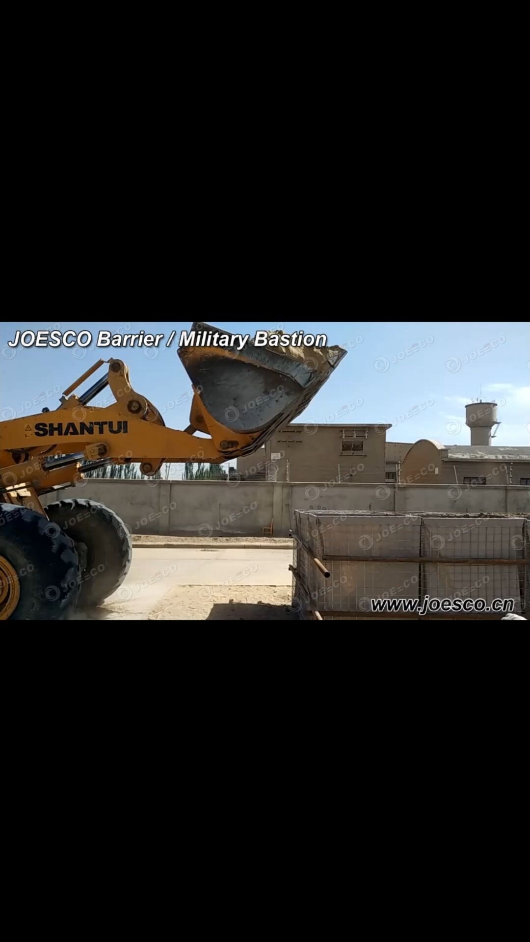 Filling military barriers with soil