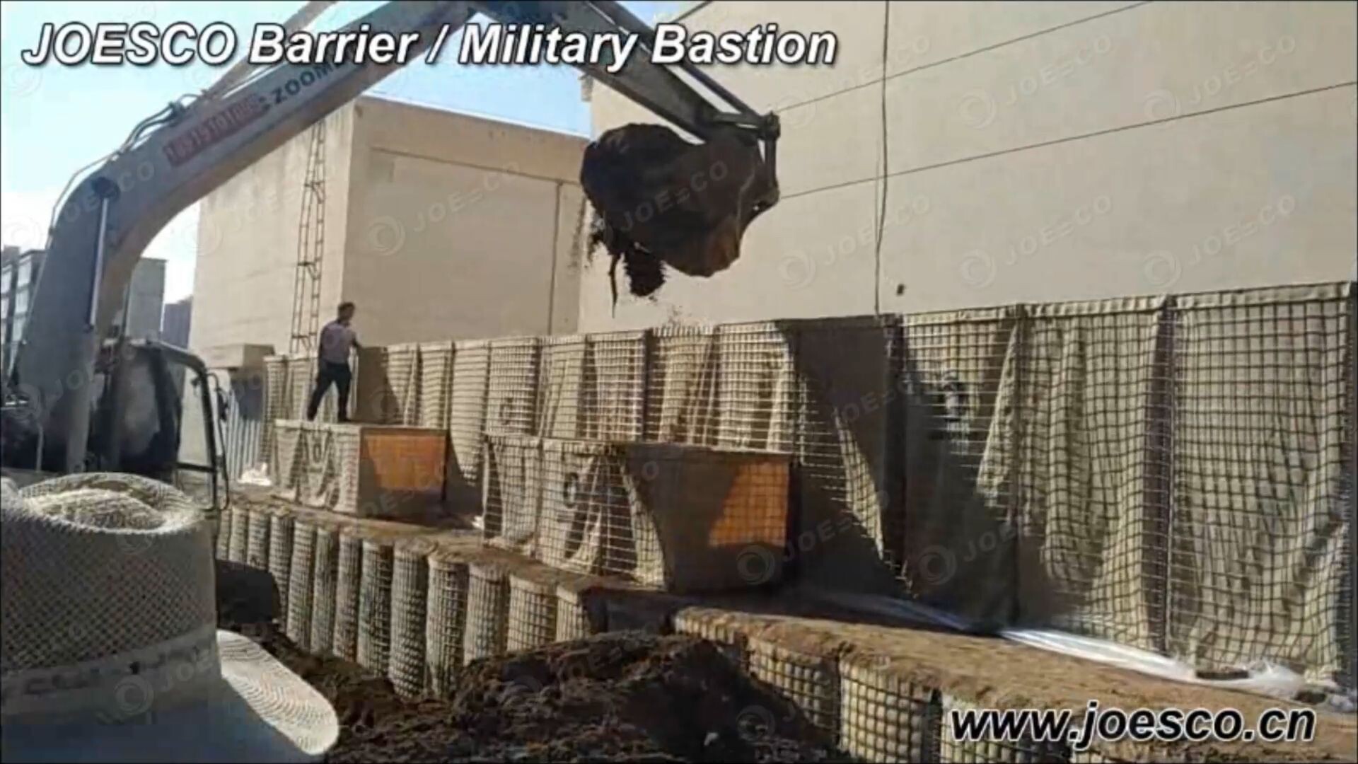 How to quickly fill a military barrier with an excavator thumbnail