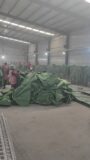The workers are industriously producing military barriers