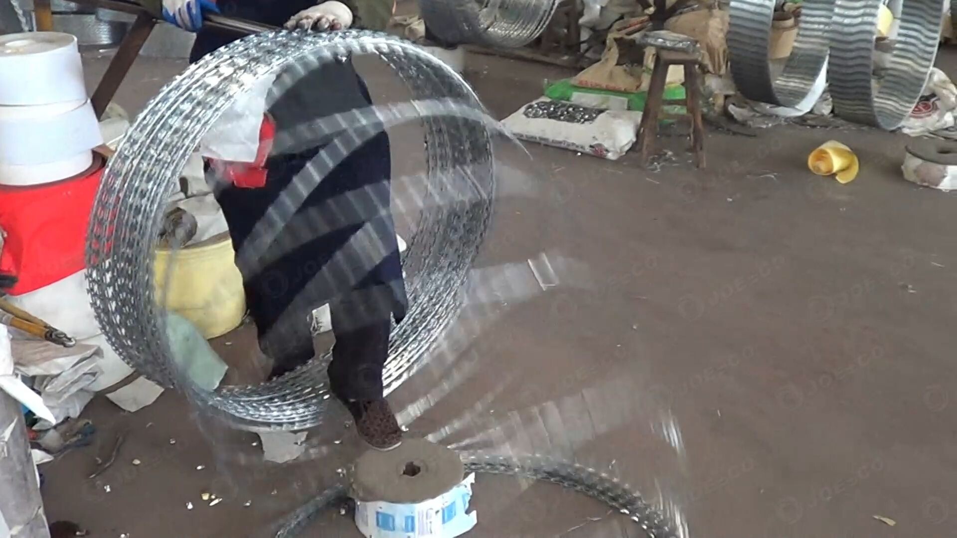 The production of razor blade wire. thumbnail