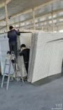 How to install a rapidly deployable military barrier inside a shipping container