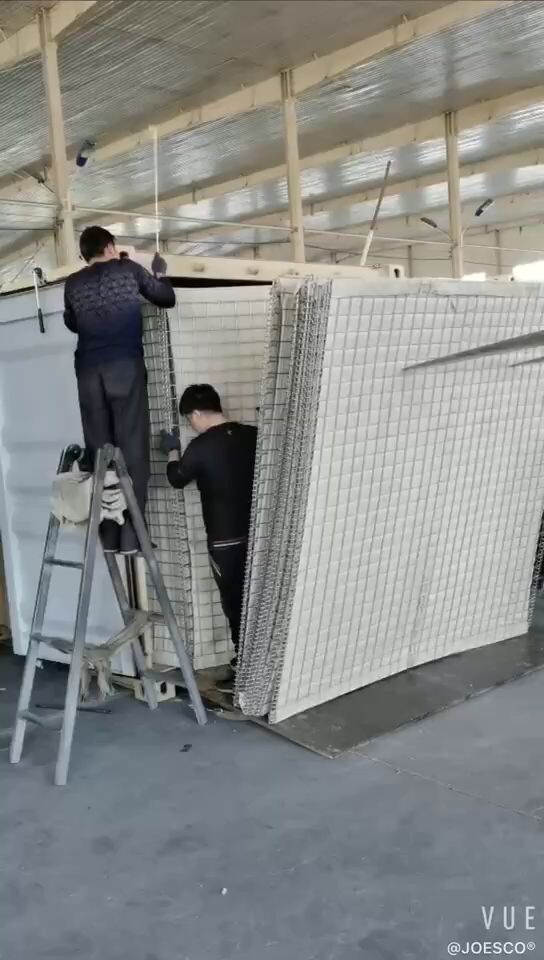 How to install a rapidly deployable military barrier inside a shipping container. thumbnail 1