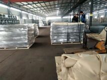 Workers are packing the assembled JOESCO military barrier